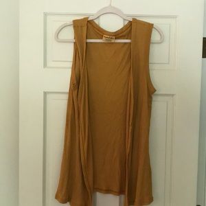 golden sleeveless cardigan sweater